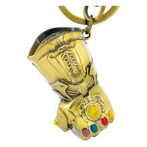 mngm68794-nyckelring-i-metall-monogram-international-marvel-infinity-gauntlet-guld-tu