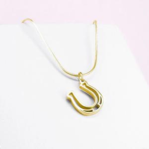 pt-pe-04-hw-gp-00-xx-hangsmycke-med-hastsko-for-kvinnor-ponytail-co-guld-tu