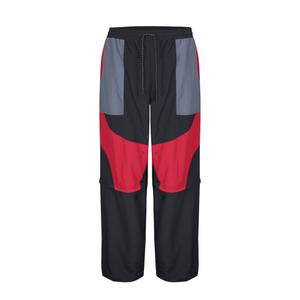 1222970-60-0-83-byxor-umbro-zip-of-l-fit-black-red-dahila-iron